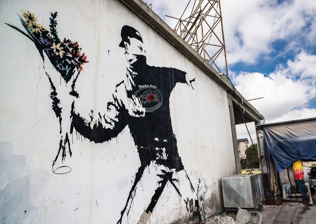 Love is in the Air by Banksy